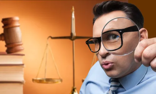 businessman glasses looking out through magnifying glass