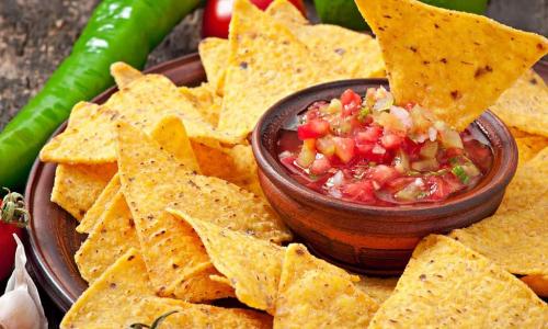 tortilla chips with salsa and peppers