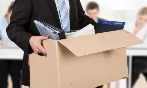 executive caring box full of his possessions 