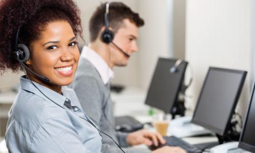 female african american call center agent smiling