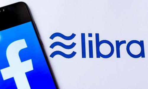 Facebook and Library logos with a smartphone