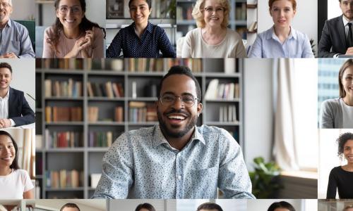 young African-American businessman leads team video conference