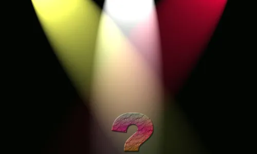 spotlights on a question mark