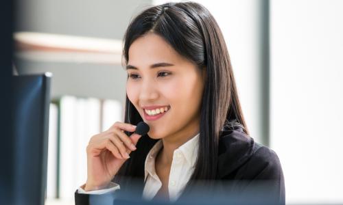 woman in a call center with computers