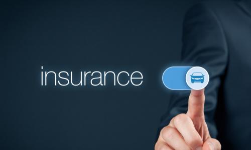 executive slides button to turn on insurance