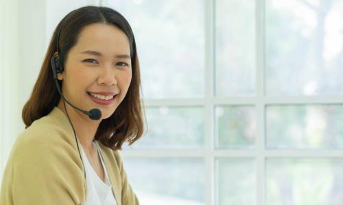 young woman wearing headset