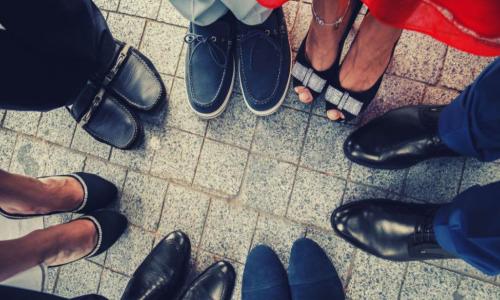 people in a circle with different shoes