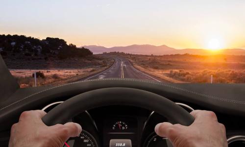 driving at sunset view out windshield