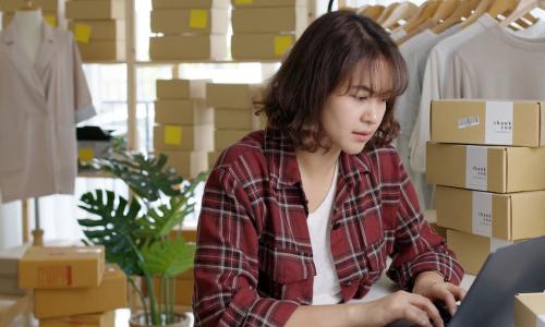 asian business woman at work in her shop