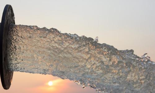 water flow pipe sunset