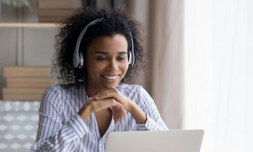 woman laptop headphones