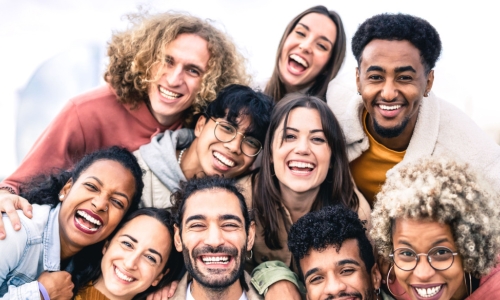 Group of diverse and smiling young people 