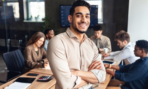 young businessman leads team of productive employees in the office