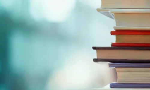 a stack of business books