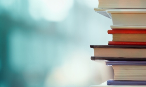 a stack of business books