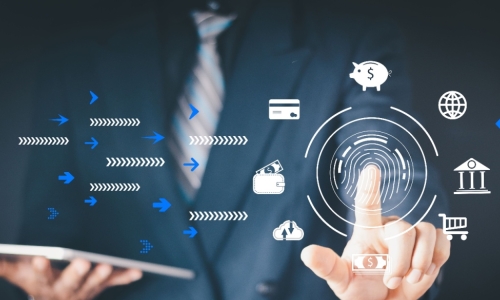 close up of businessman holding a tablet and selecting from different banking and payments icons