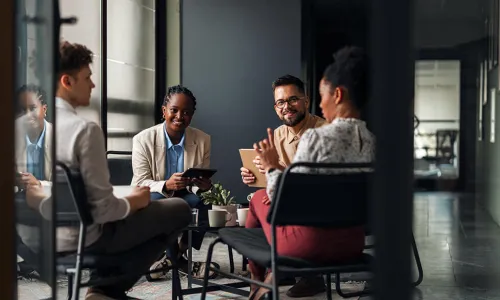 people sitting in circle having a discussion