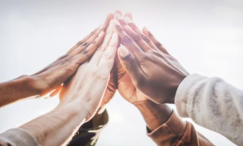 hand come together in center of image