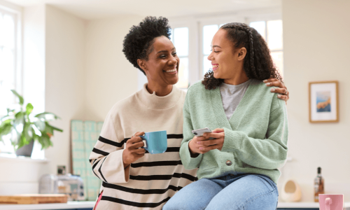 2 women laughing
